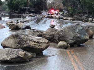 Boulders block a road after a mudslide in Montecito, California, U.S. in this photo provided by the Santa Barbara County Fire Department, January 9, 2018.