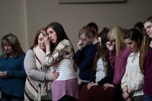 Students attend a prayer vigil for students killed and injured after a 15-year-old boy opened fire with a handgun at Marshall County High School, at Life in Christ Church in Marion, Kentucky, U.S., January 23, 2018.