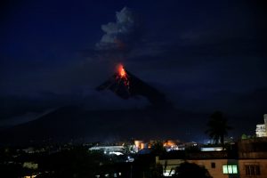 Lava flows from the crater of Mount Mayon volcano during a new eruption in Legazpi city, Albay province, Philippines January 25,