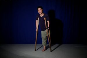 North Korean defector Ji Seong-ho, 35, poses for a photograph leaning on the crutches he used when he defected, in Seoul, South Korea, August 13, 2017