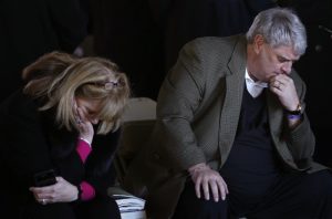 India and Greg Keith, family friends of the Grahams, pray before the funeral service for the late U.S. evangelist Billy Graham at the Billy Graham Library in Charlotte, North Carolina, U.S., March 2, 2018. REUTERS/Leah Millis