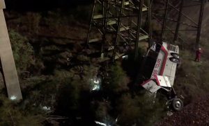 Rescue workers attend to the scene of a bus crash in Baldwin County, Alabama, U.S., March 13, 2018 in this still image obtained from social media video. Jesus Tejeda via REUTERS