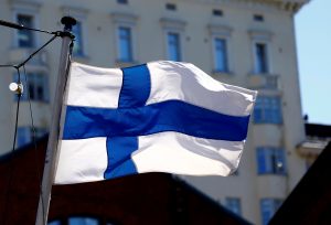 FILE PHOTO: Finland's flag flutters in Helsinki, Finland, May 3, 2017. REUTERS/Ints Kalnins/File Photo