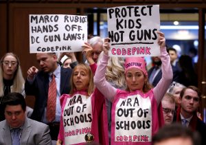 People supporting gun control attend a hearing by the Senate Judiciary Committee during a hearing about legislative proposals to improve school safety in the wake of the mass shooting at the high school in Parkland, Florida, on Capitol Hill in Washington, U.S., March 14, 2018. REUTERS/Joshua Roberts
