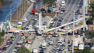 Aerial view shows a pedestrian bridge collapsed at Florida International University in Miami, Florida, U.S., March 15, 2018. REUTERS/Joe Skipper