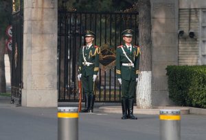 Paramilitary police officers stand guard outside the Diaoyutai State Guesthouse, where foreign dignitaries usually stay, in Beijing, China March 27, 2018. REUTERS/Jason Lee