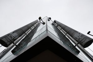 Window cleaners work outside the offices of Cambridge Analytica in central London, Britain, March 24, 2018. REUTERS/Peter Nicholls