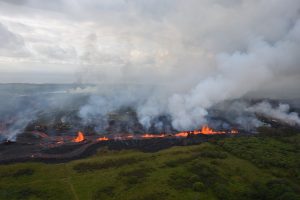 Lava flows downhill in this helicopter overflight image of Kilauea Volcano's lower East Rift zone during ongoing eruptions in Hawaii, U.S. May 19, 2018. USGS/Handout via REUTERS