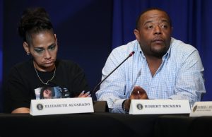 Elizabeth Alvarado and Robert Mickens, whose daughter Nisa Mickens was killed by MS-13 gang members, participate in a roundtable on immigration and the gang MS-13 attended by U.S. President Donald Trump at the Morrelly Homeland Security Center in Bethpage, New York, U.S., May 23, 2018. REUTERS/Kevin Lamarque