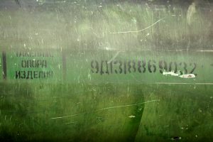Numbers are seen on a damaged missile displayed during a news conference by members of the Joint Investigation Team, comprising the authorities from Australia, Belgium, Malaysia, the Netherlands and Ukraine who present interim results in the ongoing investigation of the 2014 MH17 crash that killed 298 people over eastern Ukraine, in Bunnik, Netherlands, May 24, 2018. REUTERS/Francois Lenoir