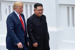 U.S. President Donald Trump and North Korean leader Kim Jong Un walk in the Capella Hotel after their working lunch, on Sentosa island in Singapore June 12, 2018. Susan Walsh/Pool via Reuters