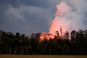 Lava erupts in Leilani Estates during ongoing eruptions of the Kilauea Volcano in Hawaii, U.S., June 9, 2018. REUTERS/Terray Sylvester