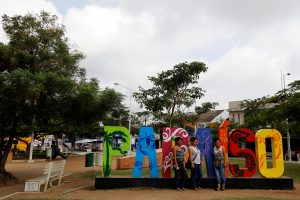 Women take a stand for a photograph with the letters of Paraiso in Paraiso, Tabasco, Mexico April 25, 2018. REUTERS/Carlos Jasso