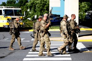 Special tactical police gather after a gunman opened fire at the Capital Gazette newspaper, killing at least five people and injuring several others in Annapolis, Maryland, U.S., June 28, 2018. REUTERS/Joshua Roberts