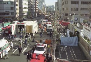 The injured of the deadly gas attack are treated by rescue workers near Tsukiji subway station in Tokyo, in this photo taken by Kyodo March 20, 1995. Mandatory credit Kyodo/via REUTERS