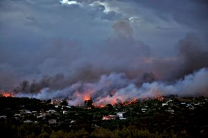 A wildfire rages in the town of Rafina, near Athens, Greece, July 23, 2018. REUTERS/Alkis Konstantinidis
