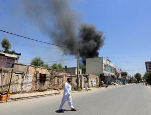 Smoke rises from an area where explosions and gunshots were heard, in Jalalabad city, Afghanistan July 31, 2018. REUTERS/Parwiz