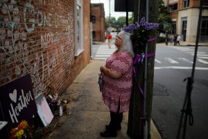 Susan Bro, mother of Heather Heyer, who was killed during the August 2017 white nationalist rally in Charlottesville, stands at the memorial at the site where her daughter was killed in Charlottesville, Virginia, U.S., July 31, 2018. REUTERS/Brian Snyder