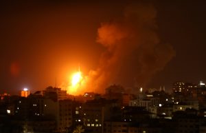 An explosion is seen during an Israeli air strike in Gaza City August 8, 2018. REUTERS/Stringer