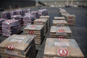 Bags of cement are seen ahead of their transfer to the Gaza Strip, inside the Kerem Shalom border crossing terminal between Israel and Gaza Strip, Israel August 15, 2018. REUTERS/Amir Cohen