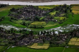 FILE PHOTO: The remains of a burned Rohingya village are seen in this aerial photograph near Maungdaw, north of Rakhine State, Myanmar September 27, 2017. REUTERS/Soe Zeya Tun/File Photo