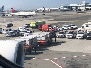 The emergency services are seen, after the passengers were taken ill on a flight from New York to Dubai, on JFK Airport, New York, U.S., September 05, 2018 in this still image obtained from from social media. Larry Coben/via REUTERS