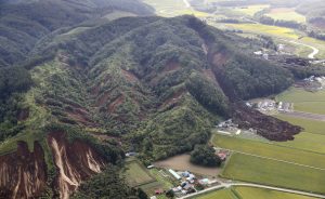 Landslides caused by an earthquake are seen in Atsuma town in Japan's northern island of Hokkaido, Japan, in this photo taken by Kyodo September 6, 2018. Kyodo/via REUTERS