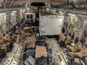 Pararescue personnel from the Alaska Air National Guard's 212th Rescue Squadron, 176th Wing, and California ANG's 131st Rescue Squadron, 129th Rescue Wing, settle into a C-17 Globemaster III aircraft in preparation for offering support to Hurricane Florence relief operations, at Moffett Federal Airfield, California, in this September 12, 2018 handout photo. Staff Sgt. Balinda O'Neal Dresel/U.S. Army National Guard/Handout via REUTERS