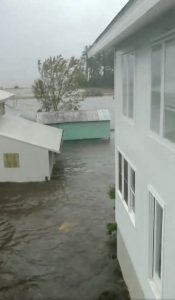 Flood waters are seen in Belhaven, North Carolina, U.S., September 14, 2018 in this still image from video obtained from social media. Courtesy of Ben Johnson/via REUTERS