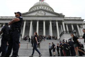 U.S. Capitol Police arrest protesters from the steps of the Capitol in the hours ahead of a scheduled U.S. Senate vote on the confirmation of Supreme Court nominee Judge Brett Kavanaugh in Washington, U.S. October 6, 2018. REUTERS/Jonathan Ernst