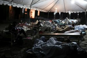 People injured in an earthquake that hit northern Haiti late on Saturday, sleep in a tent, in Port-de-Paix, Haiti, October 7, 2018. REUTERS/Ricardo Rojas