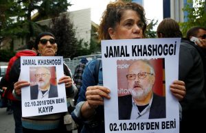 Human rights activists hold pictures of Saudi journalist Jamal Khashoggi during a protest outside the Saudi Consulate in Istanbul, Turkey October 9, 2018. REUTERS/Osman Orsal