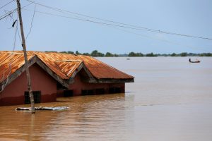 FILE PHOTO: A house partially submerged in flood waters is pictured in Lokoja city, Kogi State, Nigeria September 17, 2018. REUTERS/Afolabi Sotunde/File Photo