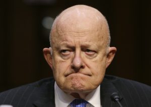 FILE PHOTO: Former Director of National Intelligence James Clapper testifies before a Senate Judiciary Committee hearing on “Russian interference in the 2016 U.S. election” on Capitol Hill in Washington, U .S., May 8, 2017. REUTERS/Jim Bourg