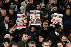 People holding pictures of Saudi journalist Jamal Khashoggi attend a symbolic funeral prayer for Khashoggi at the courtyard of Fatih mosque in Istanbul, Turkey November 16, 2018. REUTERS/Huseyin Aldemir