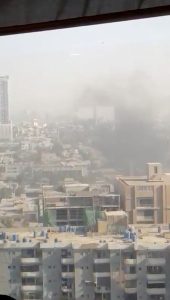 Smoke rises from the Chinese consulate after an attack by gunmen in Karachi, Pakistan, November 23, 2018 in this still image taken from a video obtained from social media. Saqib Zia/via REUTERS