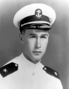 FILE PHOTO: George H. W. Bush, in uniform as a Naval Aviator Cadet, is pictured in this early 1943 handout photo obtained by Reuters November 30, 2012. George Bush Presidential Library and Museum/Handout via REUTERS/File Photo