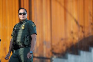 Agent J. Cruz of the U.S. Border Patrol looks on along the newly completed wall during U.S. Department of Homeland Security Secretary Kirstjen Nielsen's visit to U.S. President Donald Trump's border wall in the El Centro Sector in Calexico, California, U.S. October 26, 2018. REUTERS/Earnie Grafton