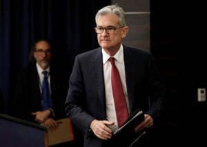 Federal Reserve Board Chairman Jerome Powell arrives at his news conference after a Federal Open Market Committee meeting in Washington, U.S., December 19, 2018. REUTERS/Yuri Gripas