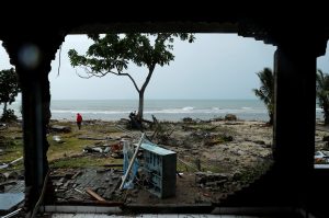 Debris is seen along a beach after a tsunami, near Sumur, Banten province, Indonesia December 26, 2018. REUTERS/Jorge Silva
