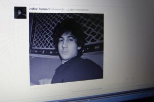 FILE PHOTO: A photograph of Djohar Tsarnaev, who is believed to be Dzhokhar Tsarnaev, a suspect in the Boston Marathon bombing, is seen on his page of Russian social networking site Vkontakte (VK), as pictured on a monitor in St. Petersburg April 19, 2013. REUTERS/Alexander Demianchuk