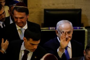 Israeli Prime Minister Benjamin Netanyahu and Brazil's President-elect Jair Bolsonaro are seen in a synagogue in Rio de Janeiro, Brazil December 28, 2018. Leo Correa/Pool via REUTERS